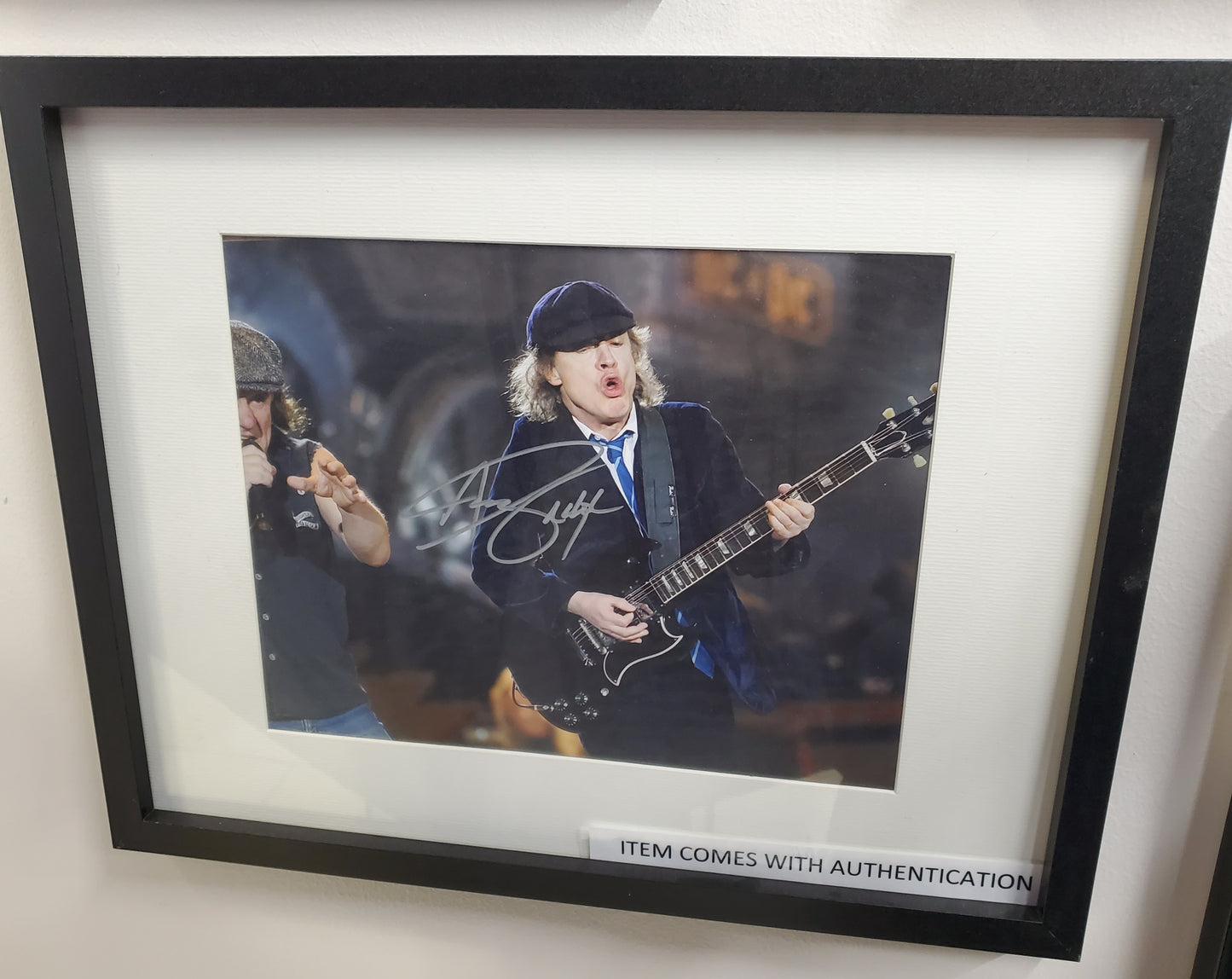 Original signature ANGUS YOUNG AC with certification included