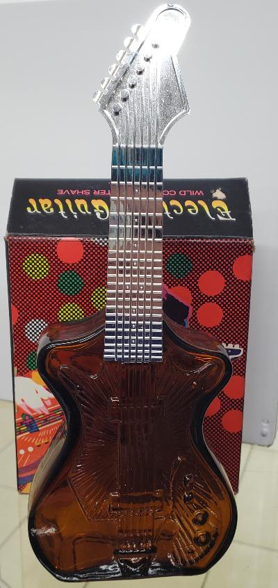 AVON COLOGNES AND PERFUMES 1970'S VINTAGE "GROOVY GUITAR" 1974